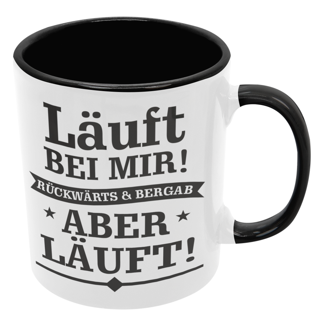 Preview: Weiße oder schwarzweiße Tasse "Läuft bei mir, rückwärts & bergab, aber läuft!